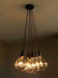 A chic, 6 light chandelier dipped in a luxurious bronze this contemporary lighting solution features a chrome finish and dimmable, frosted bulbs. Pin On Industrial Lighting