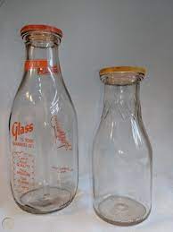 2 vtg clear glass milk bottles