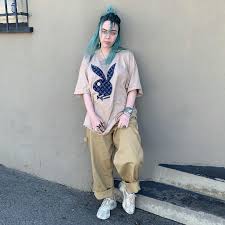 In true billie eilish style, the artist went with an oversized shirt and matching shorts for a performance, but this time, the graphics featured the initials of in addition to the stylish, and brightly colored choice of backstage outfit — which is part of the capsule collection she designed for freak city — she also. Billie Eilish Laughs At These 7 Style Rules And She Dresses Better For It Billie Billie Eilish Celebrity Outfits