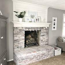 brick fireplace makeover with shiplap