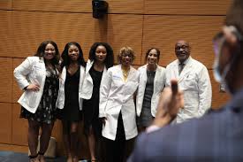 pa students don their white coats