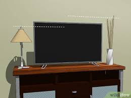 3 ways to decorate a tv stand wikihow
