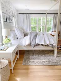 cozy bed with fluffy bedding