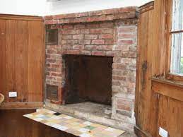 cover a brick fireplace with stone