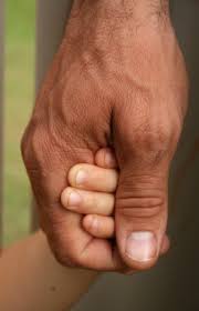 Image result for pictures of a father holding childs hand