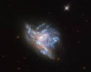 Hubble's Dazzling Display of 2 Colliding Galaxies | NASA