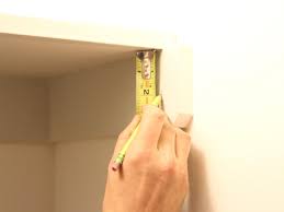 If they aren't there already, install shelves above your existing closet rod. How To Hang A Closet Rod How Tos Diy