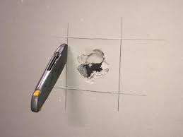 drywall repair how to fix a hole in