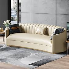 beige curved microfiber leather sofa