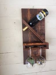 wine rack for a bottle and 2 cups out