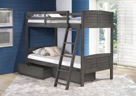Adding a bunk bed with desk improves the overall usability of the room. Donco Trading Co Import Wholesale Kids Furniture