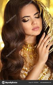golden makeup elegant brunette woman