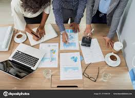 Coworkers Analyzing Charts Graphs Meeting View Stock Photo