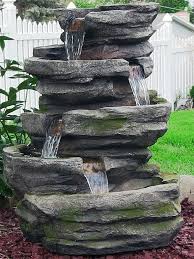 9 relaxing pond waterfall ideas for