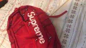 fake red supreme backpack flash s