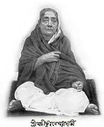 Vivekananda sitting  wearing white shawl