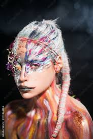 woman with colorful neon paint makeup