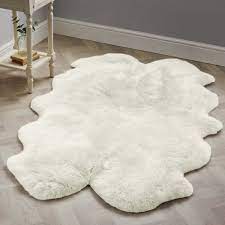 quad sheepskin rug cream by dunelm