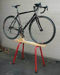 Maybe you don't have the need for a repair stand often enough. Diy Bike Stand Google Search Bike Stand Diy Bike Maintenance Stand Bike Stand