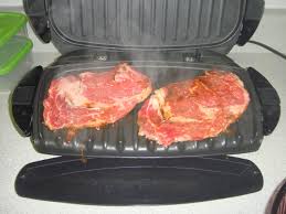 jf2021 cooking steak on foreman grill