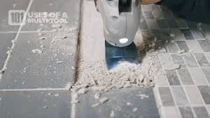 remove tile adhesive with a multi tool