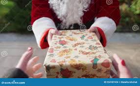 POV Santa Clause Giving Present To Unrecognizable Person Standing on  Backyard Porch. Front View Man in Red Costume with Stock Footage - Video of  male, costume: 234187434