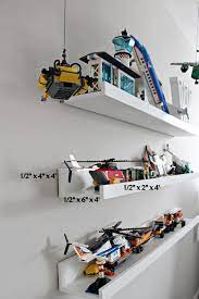 A lego mini figure display shelf that can be built in an afternoon. Diy Lego Display Shelf Stately Home Lane Lego Display Shelf Lego Bedroom Lego Room