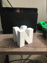 3d viewer is not available. N64 Nintendo 64 Cube Video Game Logo Sign Man Cave Game Etsy In 2021 Nintendo Decor Man Cave Games 3d Printing