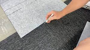 cut install carpet tiles to wall edges