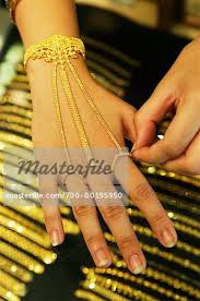 woman s hand wearing jewelry little