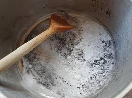to clean a burnt milk pan