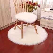 fusked white faux fur floor mat and a