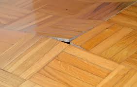 how to fix buckled wood flooring