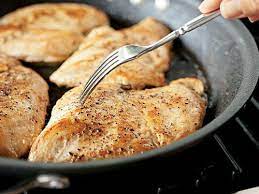 How do you create simple pan-fried chicken breasts?
