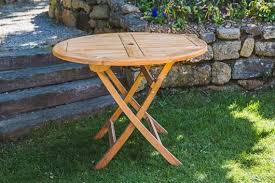Dahlia multibrown circular folding wicker outdoor dining table. Folding Garden Table Ottena Garden Furniture