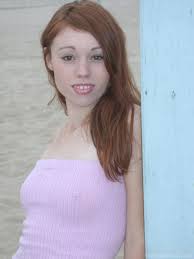 Sexy redhead Rose Bud flaunts her small tits & sexy pussy at beach  playground - NakedPics