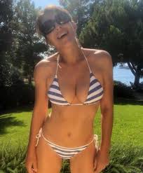 How could i resist? she. Elizabeth Hurley 55 Shows Off Killer Abs In Bikini