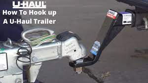 How to Hook Up a U-Haul Trailer with a Drop & Tow Coupler - YouTube