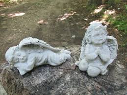 adorable pair of cement baby angel