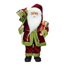 A newborn boy in a red santa suit, fur boots and a christmas hat with a christmas gingerbread in his hands on a green screen. Northlight 16 Red And Green Grand Imperial Santa Claus With Gift Bag Christmas Tabletop Figurine Target