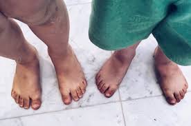 Foot powder doesn't just do wonders on feet, it also helps dry out kid's stinky shoes. Summer Feet Stock Photo 964a8514 Feaf 4904 A5bb 1834d182c335