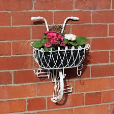 white metal bicycle basket wall planter