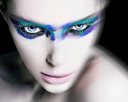 woman wearing dramatic eye makeup stock