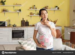 Pregnant Asian Woman Thinking Sex Her Baby Home Stock Photo by ©serezniy  441465480