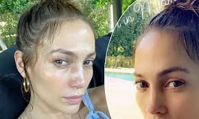 No makeup, photobombed by son in cute instagram pic! Jennifer Lopez Glows In Makeup Free Selfie For No Filter Friday As She Spends Winter In Miami Daily Mail Online