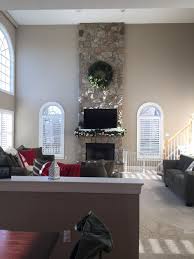 how to decorate two story walls