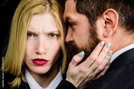 man beard woman touching face