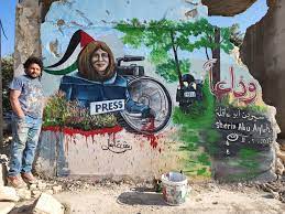 Syrian artists paint mural in tribute ...