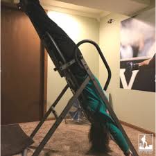can an inversion table heal a herniated