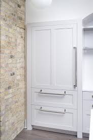 White Paneled Pantry Cabinets